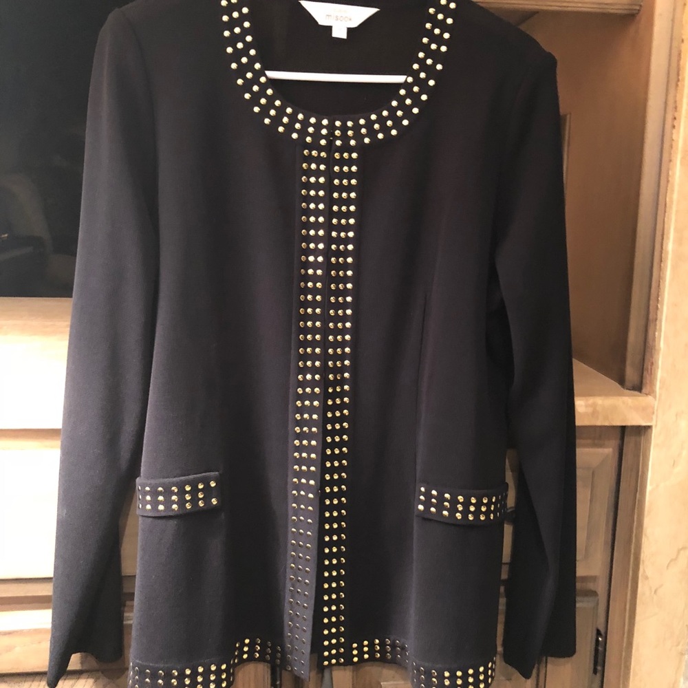 Black jacket with gold trim.